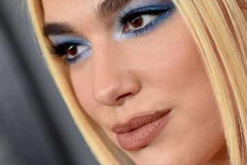 Dua Lipa e a Revolução da Maquiagem Cyber Core: A Estética Brilhante de 2026