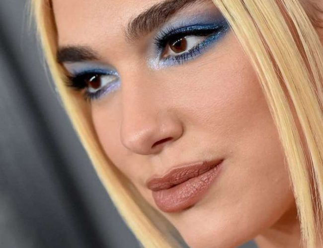 Dua Lipa e a Revolução da Maquiagem Cyber Core: A Estética Brilhante de 2026